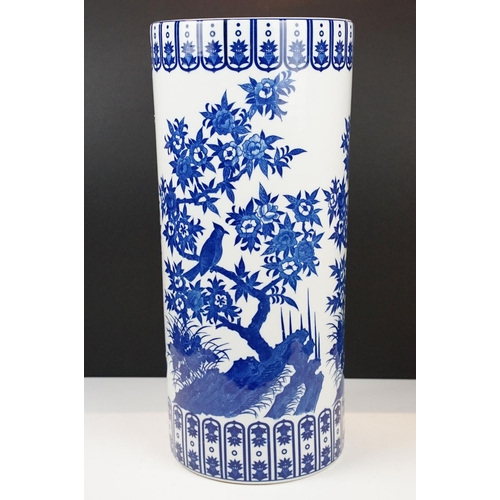 29 - Oriental blue & white porcelain cylindrical floor vase decorated with bird perched on blossoming bra... 