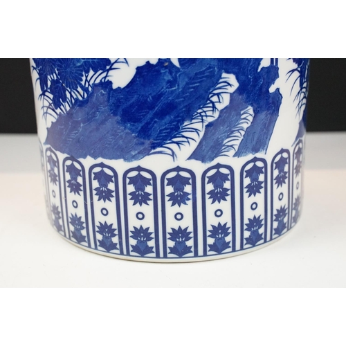 29 - Oriental blue & white porcelain cylindrical floor vase decorated with bird perched on blossoming bra... 