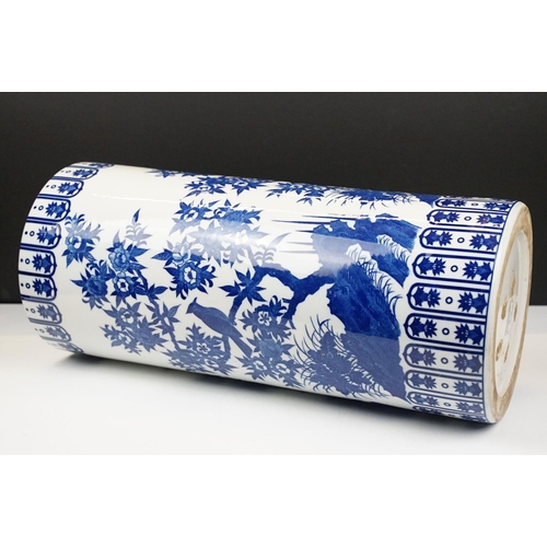 29 - Oriental blue & white porcelain cylindrical floor vase decorated with bird perched on blossoming bra... 