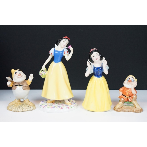 44 - Collection of 11 Royal Doulton Disney Snow White porcelain figures to include Snow White (DP 5), Doc... 