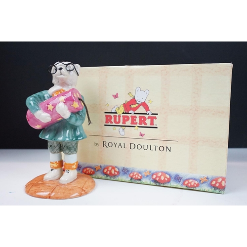 49 - Collection of Royal Doulton Rupert figurines in original boxes. Lot includes nine bears in total.