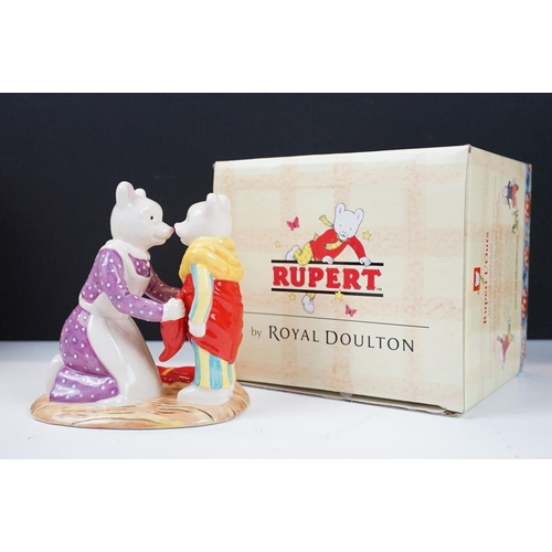 49 - Collection of Royal Doulton Rupert figurines in original boxes. Lot includes nine bears in total.