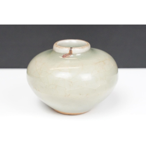 54 - Chinese pottery vessel, early Ming dynasty of squat ovoid form with a longquan celadon glaze, 6cm hi... 