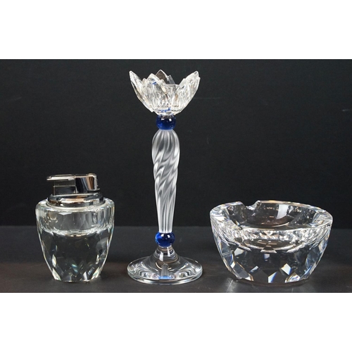 55 - Collection of Swarovski, comprising: candlestick with twisted stem, 16.5cm high, table lighter, 9cm ... 