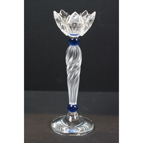 55 - Collection of Swarovski, comprising: candlestick with twisted stem, 16.5cm high, table lighter, 9cm ... 