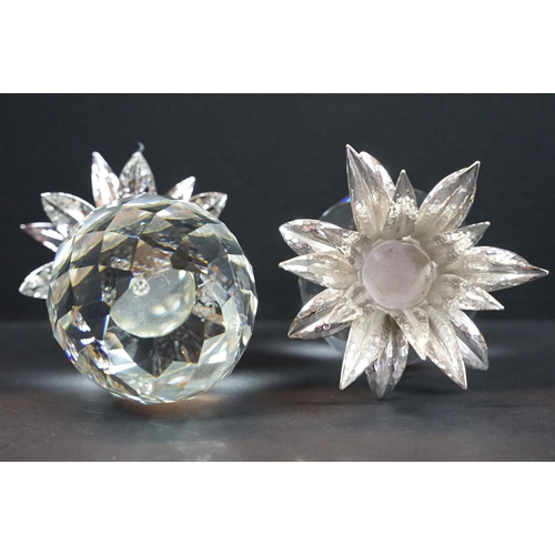 56 - Collection of Swarovski, comprising: two pineapples, 11cm high, group of two seals resting on a rock... 