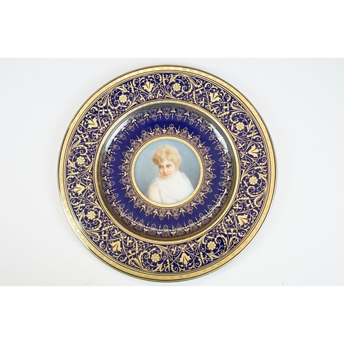 59 - Continental cobalt blue ground cabinet plate with hand painted portrait of a female to centre, borde... 