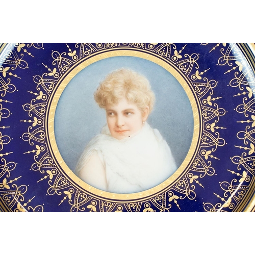 59 - Continental cobalt blue ground cabinet plate with hand painted portrait of a female to centre, borde... 