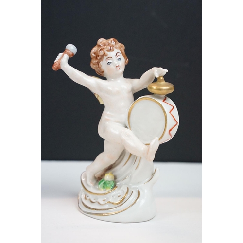 60 - German porcelain five piece band of cherubs / putti with gilt detail, printed marks to bases, approx... 