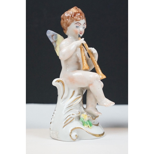 60 - German porcelain five piece band of cherubs / putti with gilt detail, printed marks to bases, approx... 