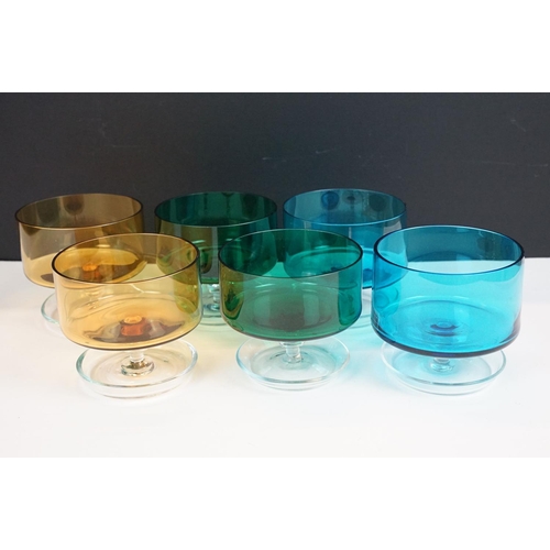 66 - Set of six 20th century coloured glass sundae dishes of circular form, to include blue, amber and gr... 