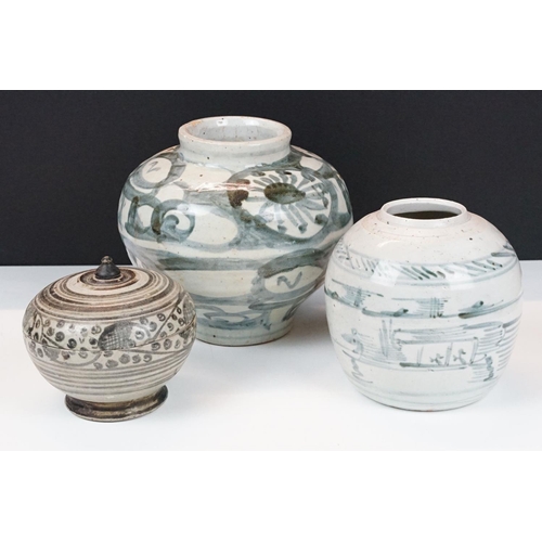 7 - Group of three South East Asian ceramics to include a large blue & white pottery ovoid vessel with g... 