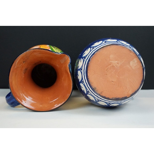 70 - Collection of Portuguese floral terracotta to include two jugs (approx 23cm tall), to larger plates ... 