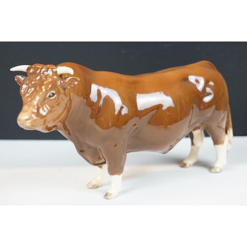 73 - Beswick Limousin bull in brown gloss (BOC 1998, approx 12cm tall), together with a Beswick Highland ... 