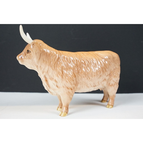 73 - Beswick Limousin bull in brown gloss (BOC 1998, approx 12cm tall), together with a Beswick Highland ... 