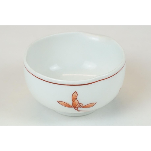 75 - Japanese porcelain part tea set comprising teapot, milk jug and five cups, together with five fan sh... 