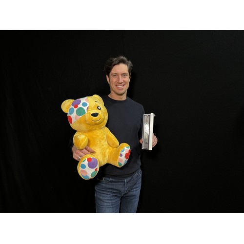 70 - A one-off handcrafted silver bookmark, embossed with Pudsey Bear, and a Pudsey soft toy signed by BB... 