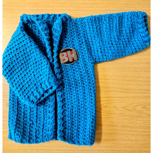 73 - A miniature blue Bargain Hunt jacket (approx. for a one year old) hand-crocheted and appliquéd by Ba... 