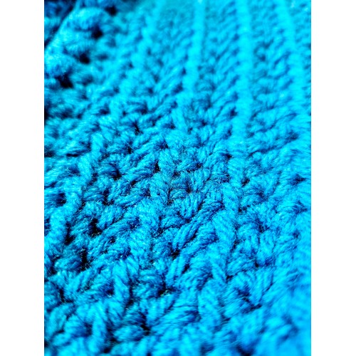 73 - A miniature blue Bargain Hunt jacket (approx. for a one year old) hand-crocheted and appliquéd by Ba... 