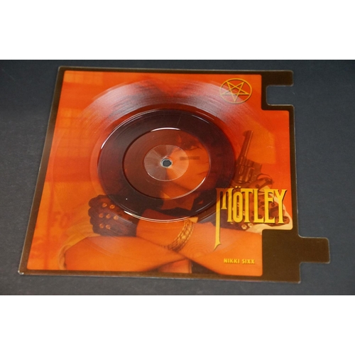 582 - Vinyl - Motley Crue 2 interconnecting shaped picture discs for Smokin' In The Boys Room / Home Sweet... 