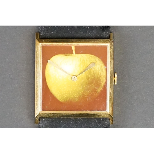 1555 - Memorabilia - Apple / The Beatles: Original Apple Records watch from 1968. Square face, printed with... 