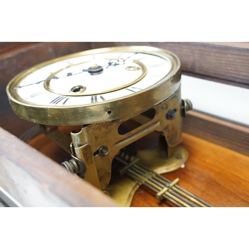 106 - Early 20th century Vienna pendulum wall clock, the enameled face with Roman numerals to the chapter ... 