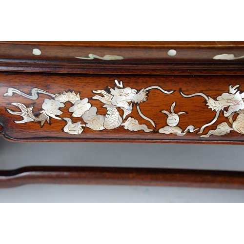 109 - Chinese small hardwood table top stand of rectangular form, with mother of pearl inlaid dragon decor... 