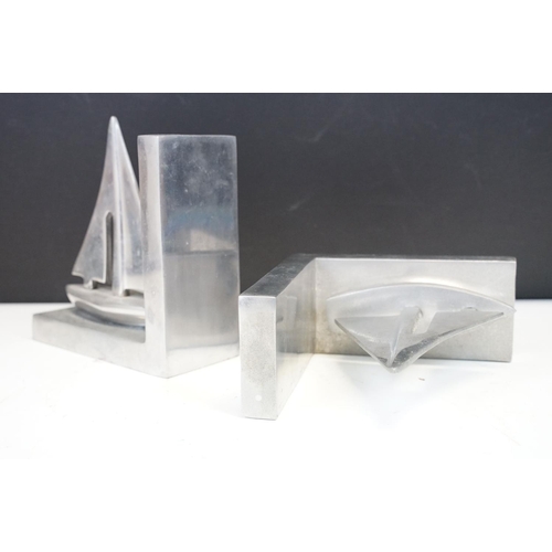 113 - Pair of aluminium nautical bookends in the form of sailing boats, approx 16cm high