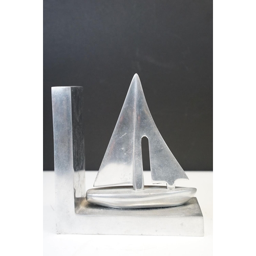 113 - Pair of aluminium nautical bookends in the form of sailing boats, approx 16cm high