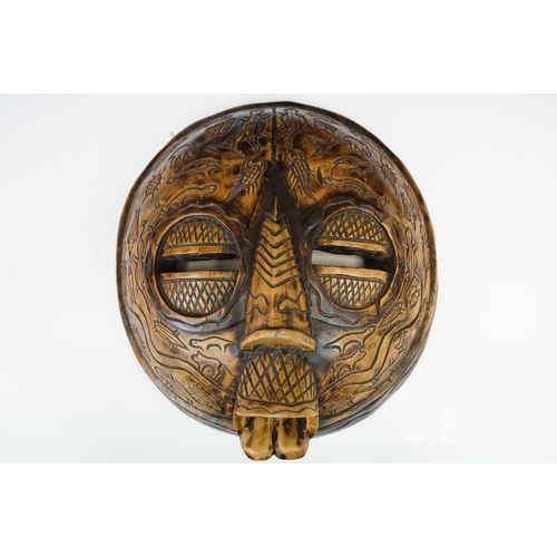 116 - Large carved wood tribal mask, 40cm high