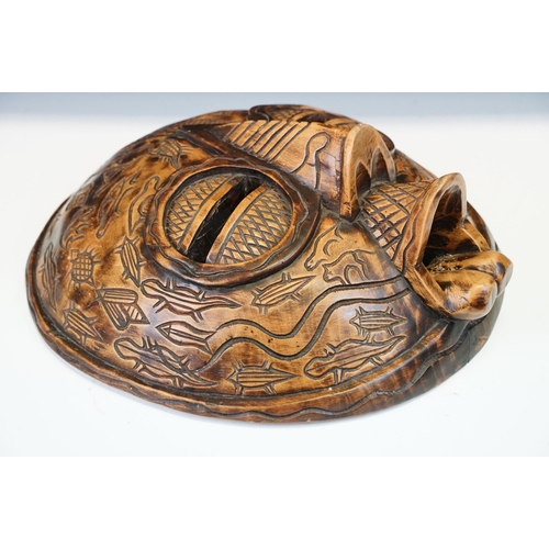 116 - Large carved wood tribal mask, 40cm high