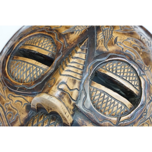 116 - Large carved wood tribal mask, 40cm high