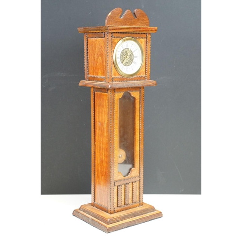 124 - Late 19th / early 20th century chiming mantel clock, the white enamel dial with black Roman numerals... 