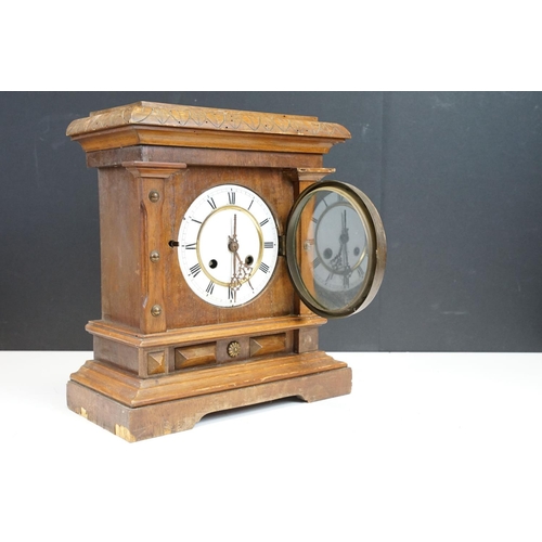 124 - Late 19th / early 20th century chiming mantel clock, the white enamel dial with black Roman numerals... 