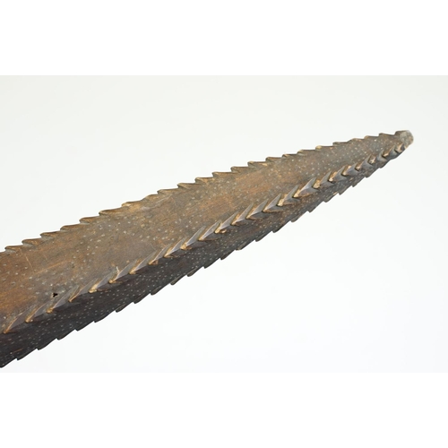 125 - Polynesian hardwood club with carved jagged edges and poker work type decoration to handle (approx 6... 