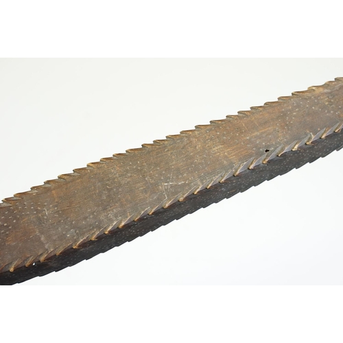 125 - Polynesian hardwood club with carved jagged edges and poker work type decoration to handle (approx 6... 