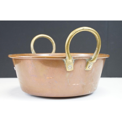 125A - Late 19th / early 20th C heavy copper jam pan with brass riveted handles, 51cm diameter, 12.5cm dept... 