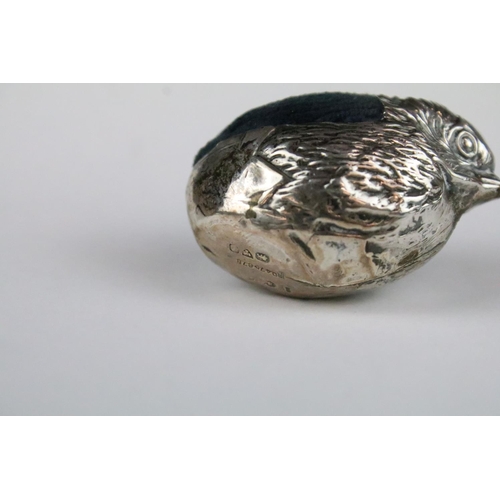 143 - A fully hallmarked sterling silver pin cushion in the form of chick, blue velvet cushion, maker mark... 