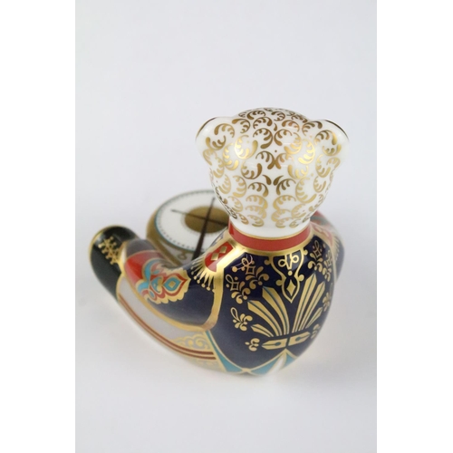 147 - Two Royal Crown Derby paperweights to include Bow Tie Bear and Drummer Bear, with gold stoppers