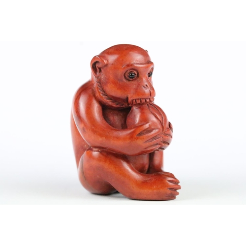 152 - Two signed carved wood netsuke figures to included a Monkey with nut and Turtles, 5cm approx