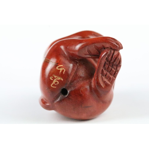 152 - Two signed carved wood netsuke figures to included a Monkey with nut and Turtles, 5cm approx