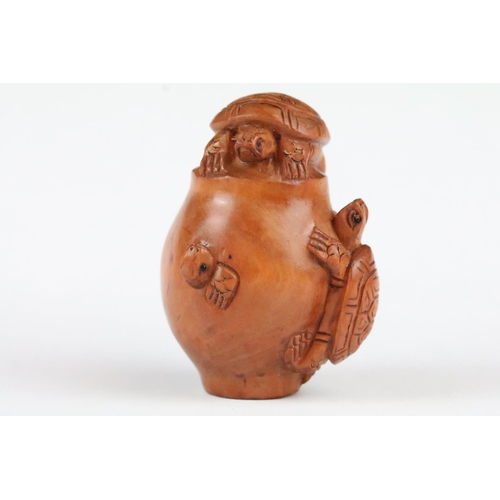 152 - Two signed carved wood netsuke figures to included a Monkey with nut and Turtles, 5cm approx