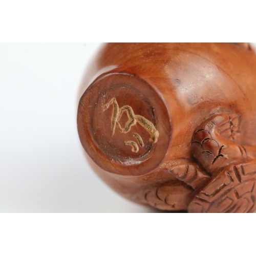 152 - Two signed carved wood netsuke figures to included a Monkey with nut and Turtles, 5cm approx