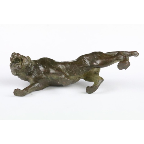 153 - An ornamental Chinese bronze tiger, measures approx 13cm in length.