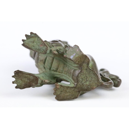 159 - A Chinese ornamental bronze dog of foo statue