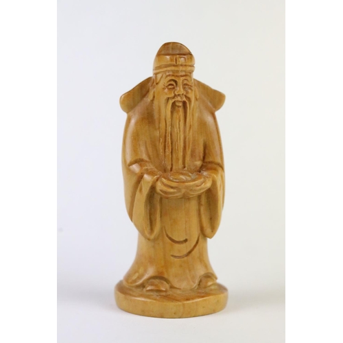 165 - Two carved wooden netsuke figure to include a Little Monk and an Old Man with offering, 6cm approx