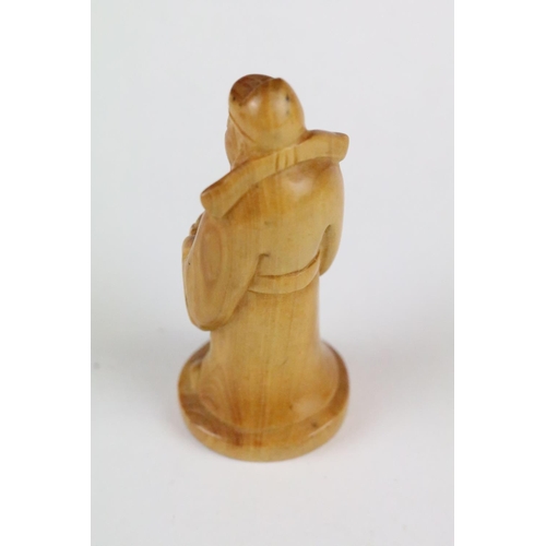 165 - Two carved wooden netsuke figure to include a Little Monk and an Old Man with offering, 6cm approx