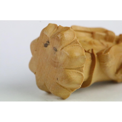 165 - Two carved wooden netsuke figure to include a Little Monk and an Old Man with offering, 6cm approx