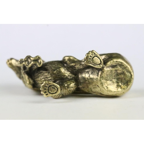 173 - A Chinese brass ornamental lucky rat figure with money bag, character marks to bag