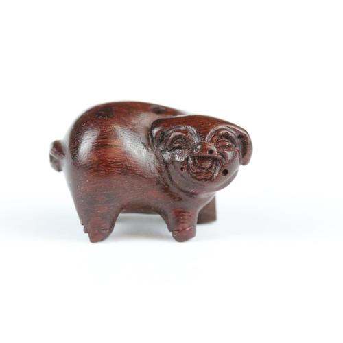 181 - Three carved wooden miniature netsuke figures to include signed Pig, Money Goat and a Dragon